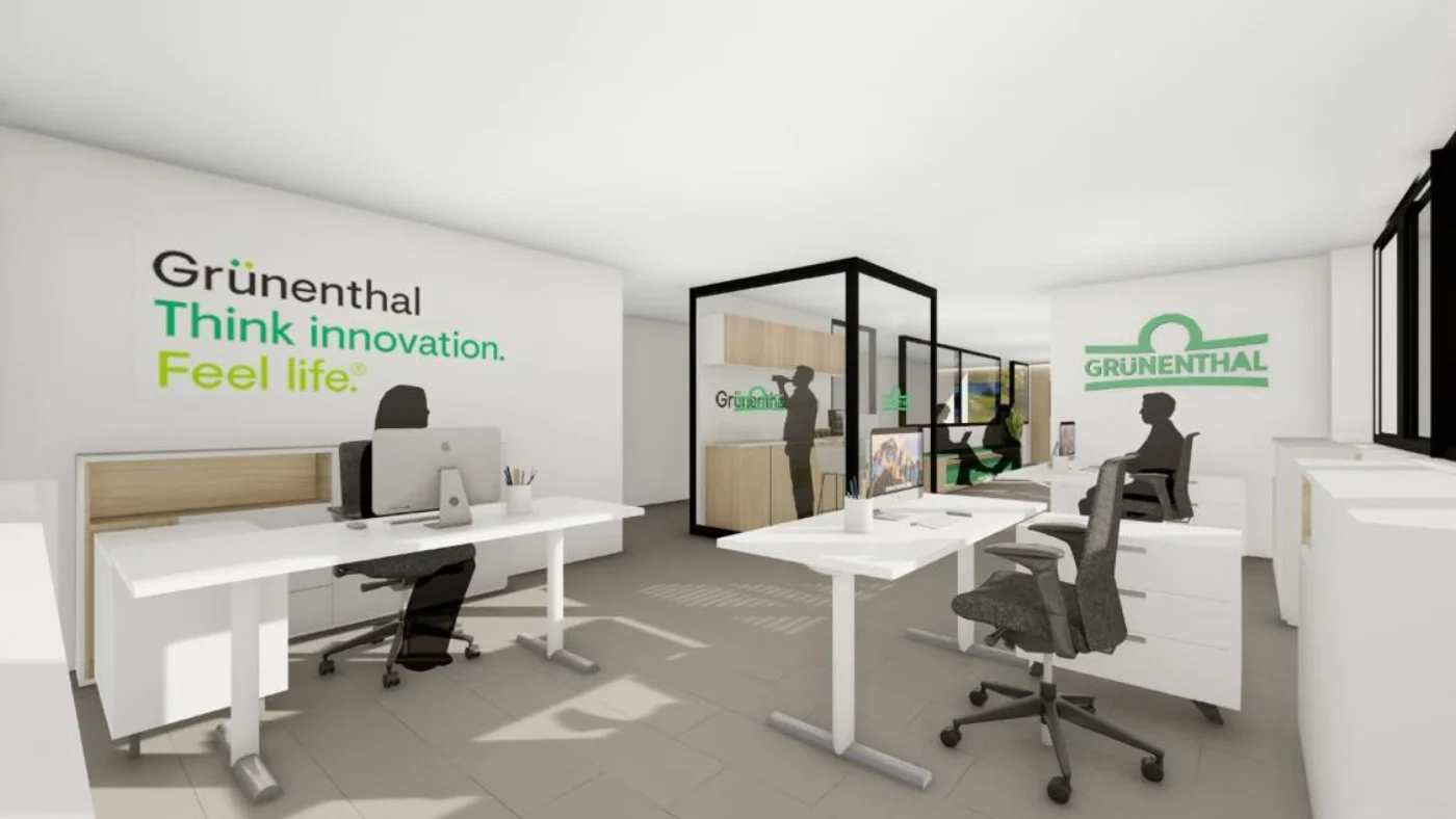 Render de área de trabajo Grünenthal con identidad de marca en paredes